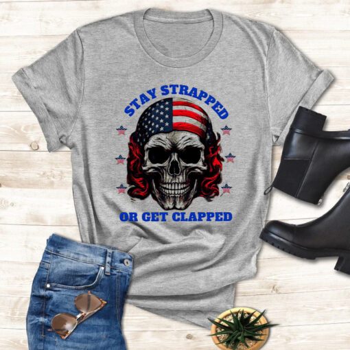 Skull American flag Stay strapped or get clapped t shirt